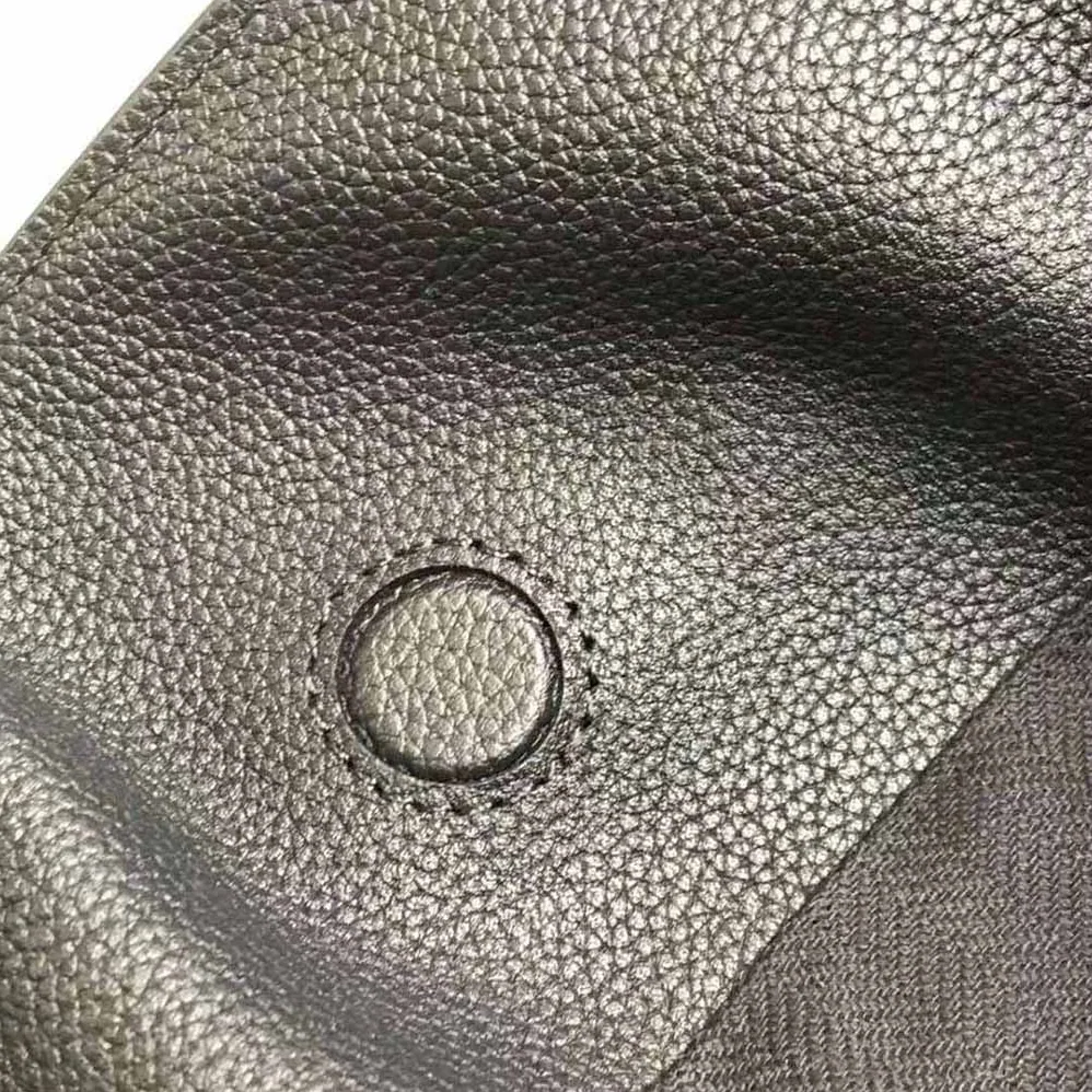 Loewe Mini Flamenco Clutch in Anagram Jacquard and Calfskin for Women in Black