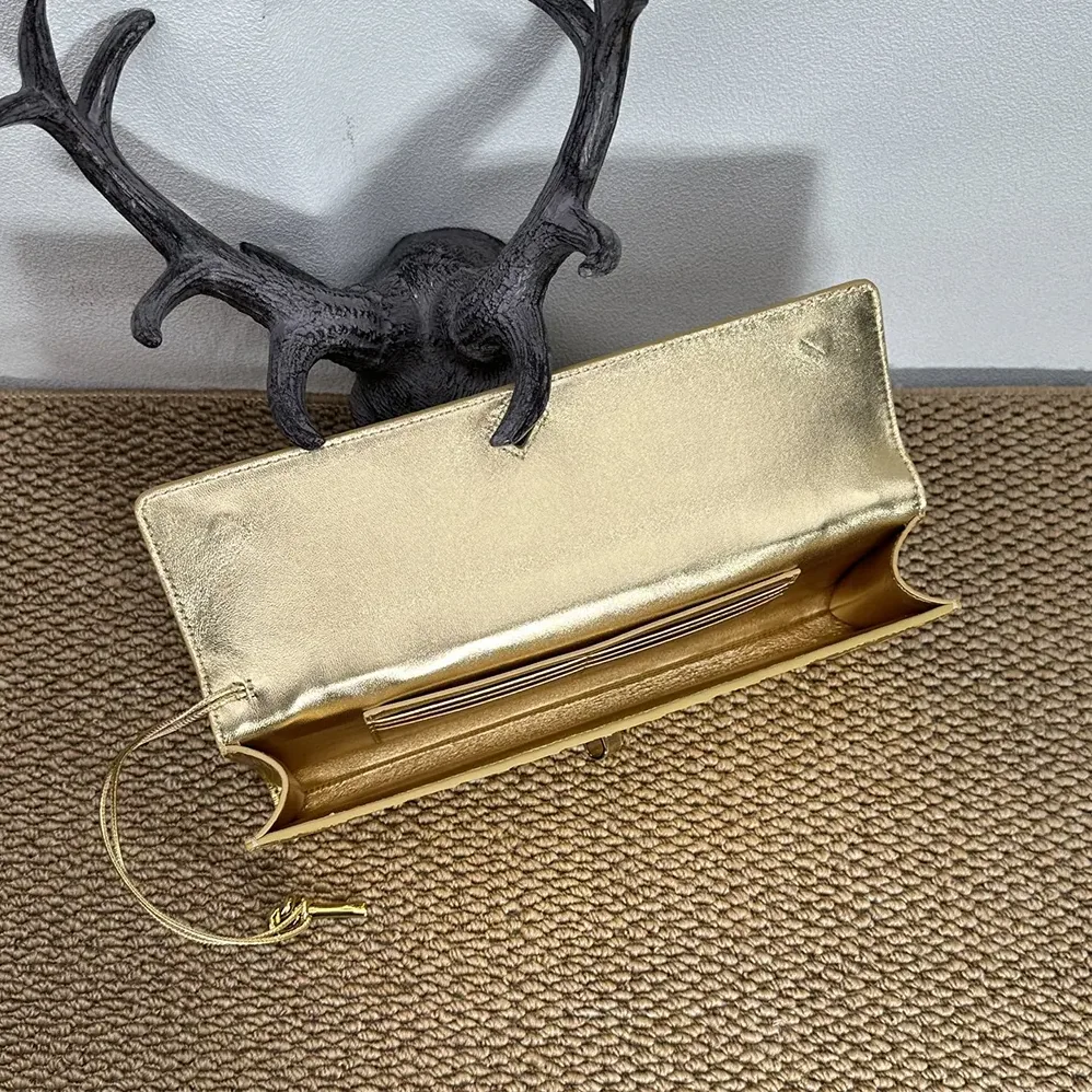 Bottega Veneta Andiamo Clutch for Women in Gold