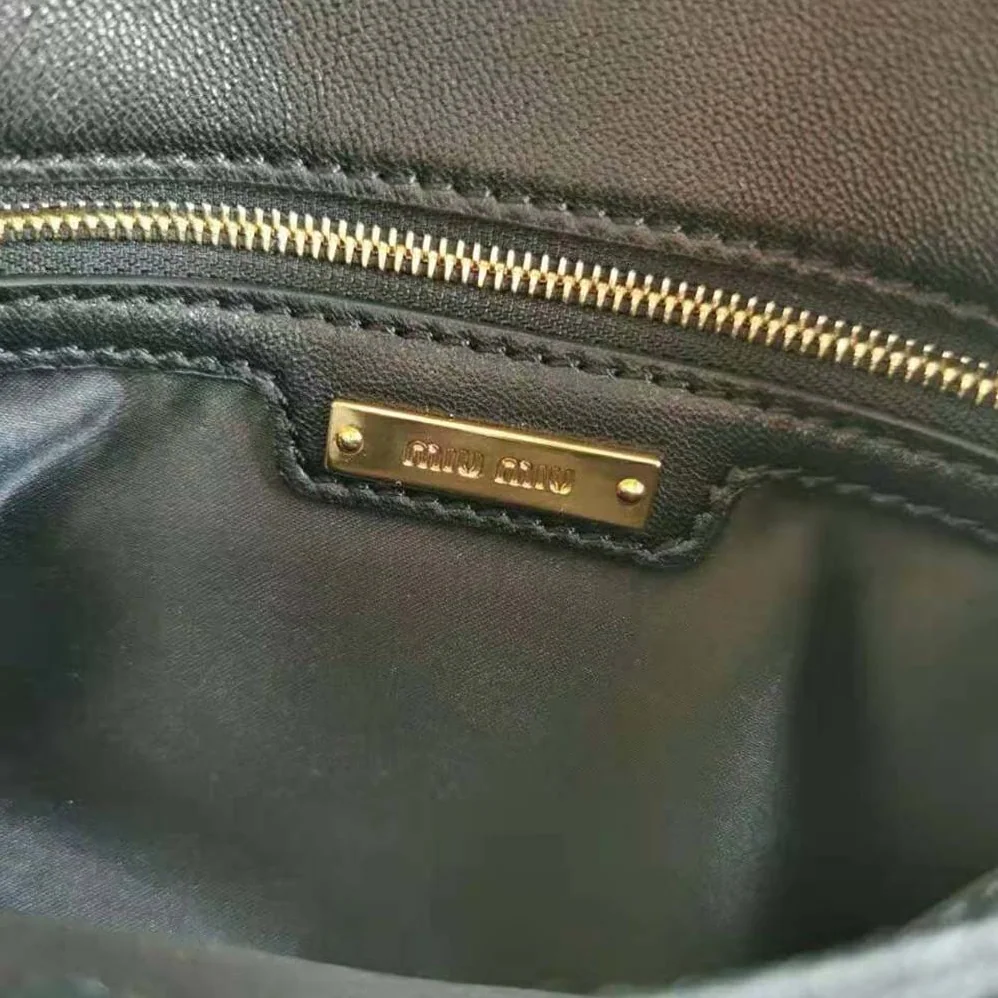 Miu Miu Matelasse Nappa Leather Shoulder Bag for Women in Black