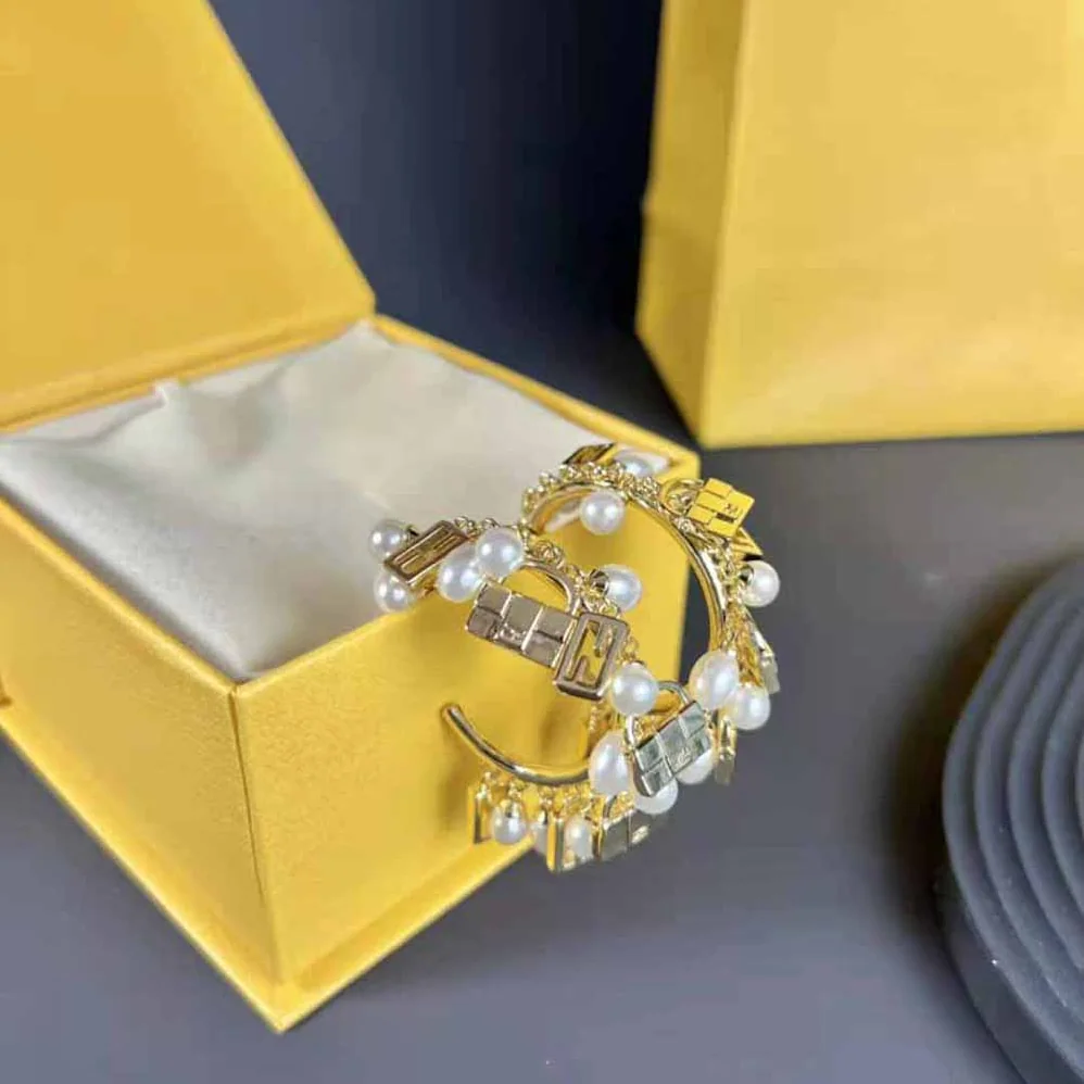 Fendi Baguette Earrings Gold for Women in colored