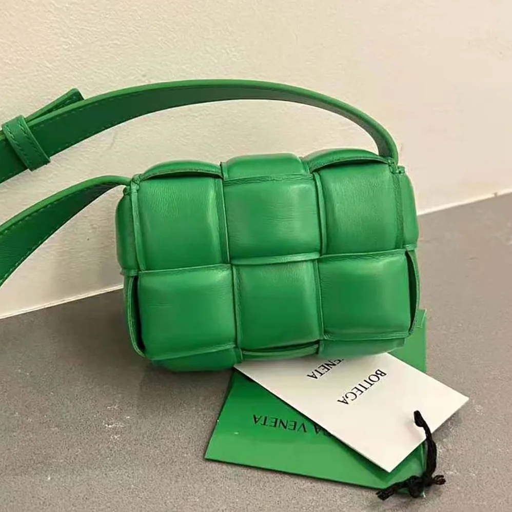Bottega Veneta Candy Padded Cassette Mini Padded Intreccio Leather Cross-Body Bag for Women in Green Bottega Veneta Candy Padded Cassette Mini Padded Intreccio Leather Cross-Body Bag for Women in Green