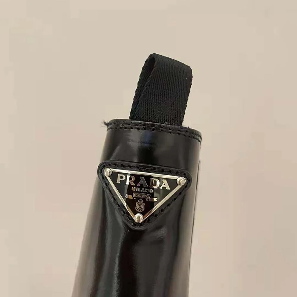 Prada Monolith Brushed Leather Booties for Women in Black