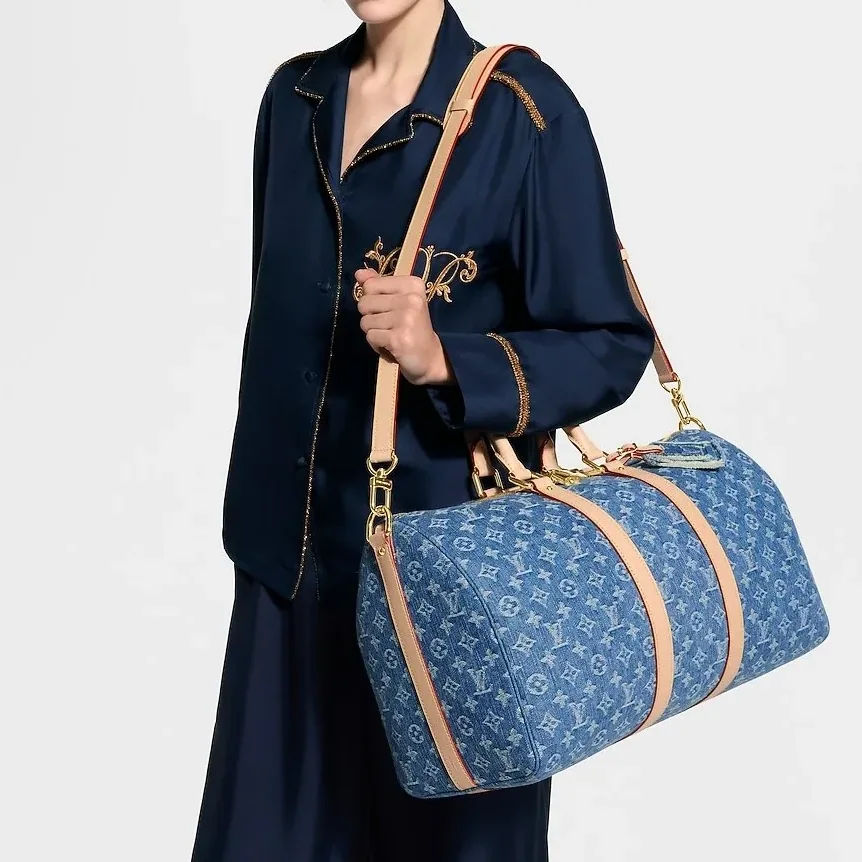 Louis Vuitton Keepall Bandouliere 45 Travel Bag in Blue Denim Gold Hardware Louis Vuitton Keepall Bandouliere 45 Travel Bag in Blue Denim Gold Hardware