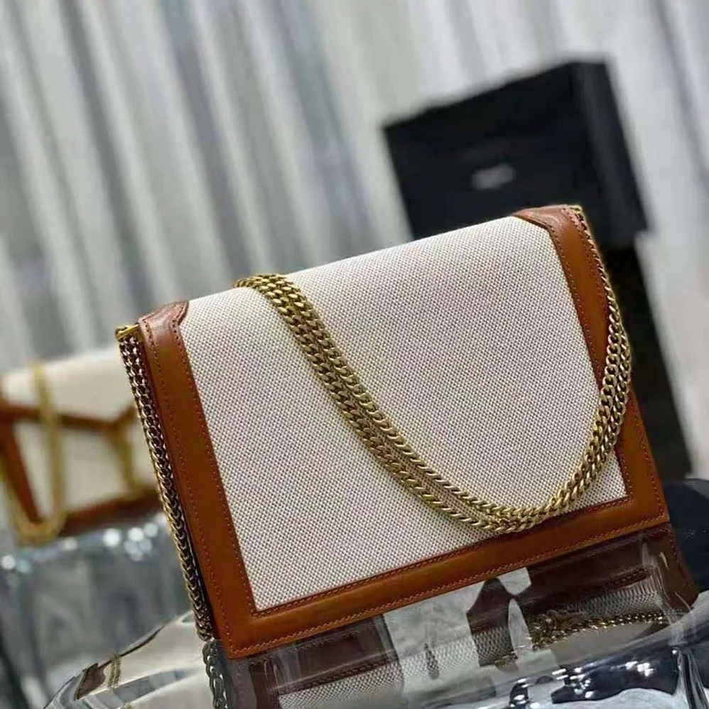 Saint Laurent YSL Cassandra Monogram Clasp Bag in Canvas and Smooth Leather for Women