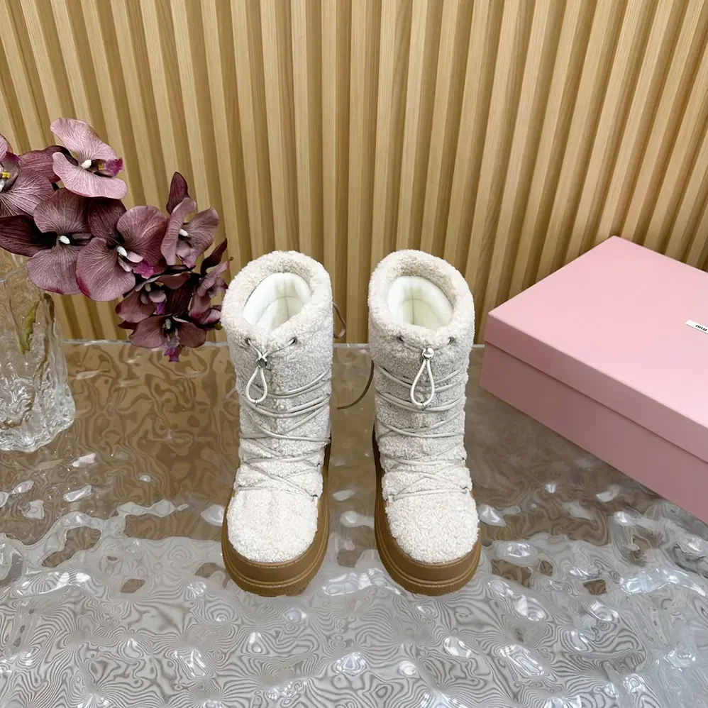 Miu Miu Shearling Après-ski Boots for Women in White