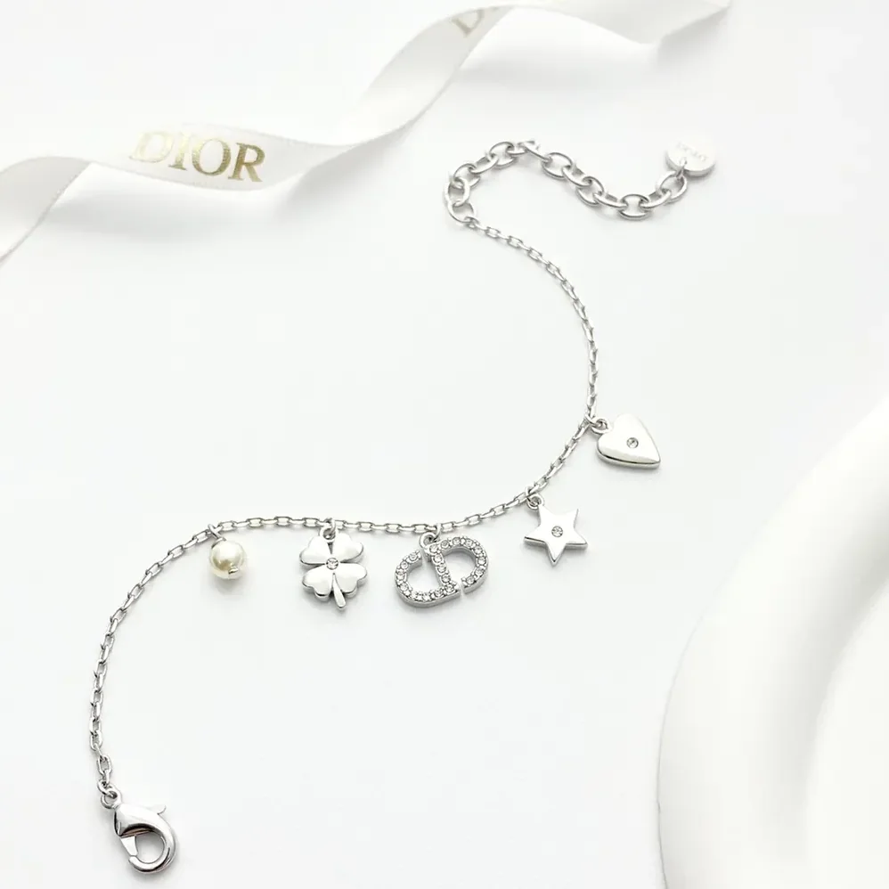 Dior Petit CD Lucky Charms Bracelet Silver-Finish Metal with White Resin Pearl and Silver for Women in Tone Crystals Dior Petit CD Lucky Charms Bracelet Silver-Finish Metal with White Resin Pearl and Silver for Women in Tone Crystals