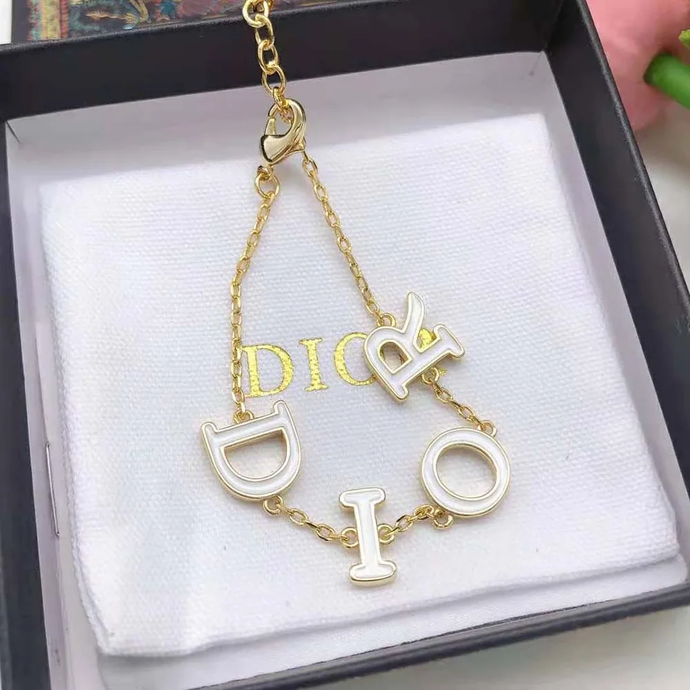 Dior Dio(r)evolution Bracelet Gold-Finish Metal and White Lacquer for Women Dior Dio(r)evolution Bracelet Gold-Finish Metal and White Lacquer for Women