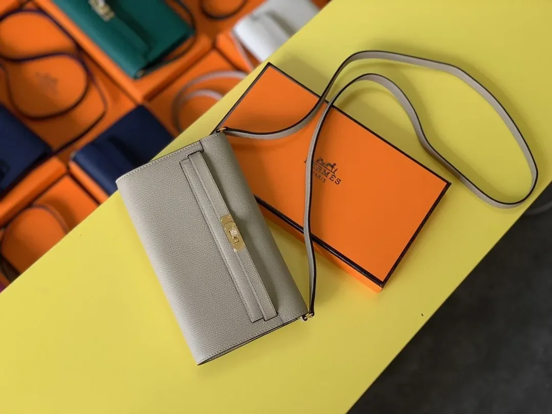 Hermes Kelly Classique To Go Wallet in Gold Toned Hardware Cream