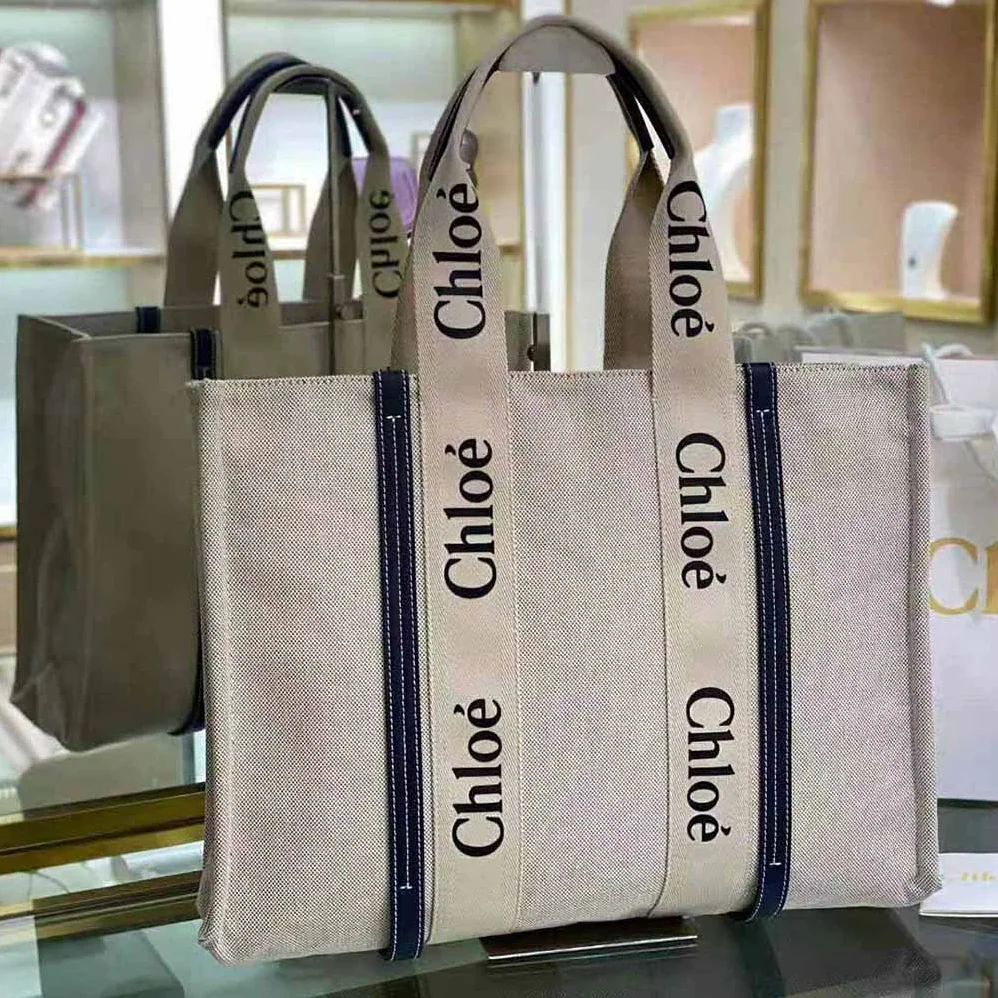 Chloe Large Woody Tote Bag in Cotton Canvas and Shiny Calfskin with Woody Ribbo for Women Chloe Large Woody Tote Bag in Cotton Canvas and Shiny Calfskin with Woody Ribbo for Women