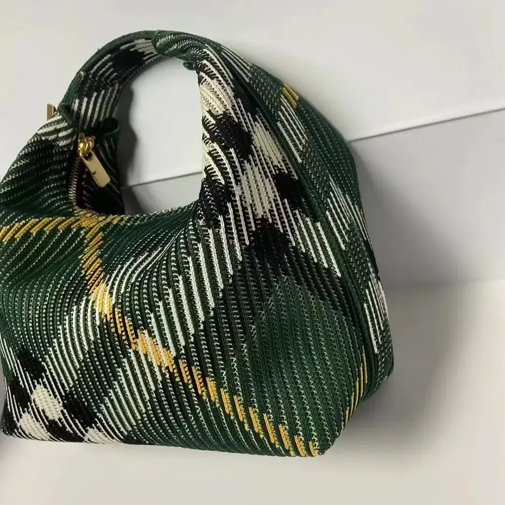 Burberry Mini Peg Duffle Bag for Women in Green