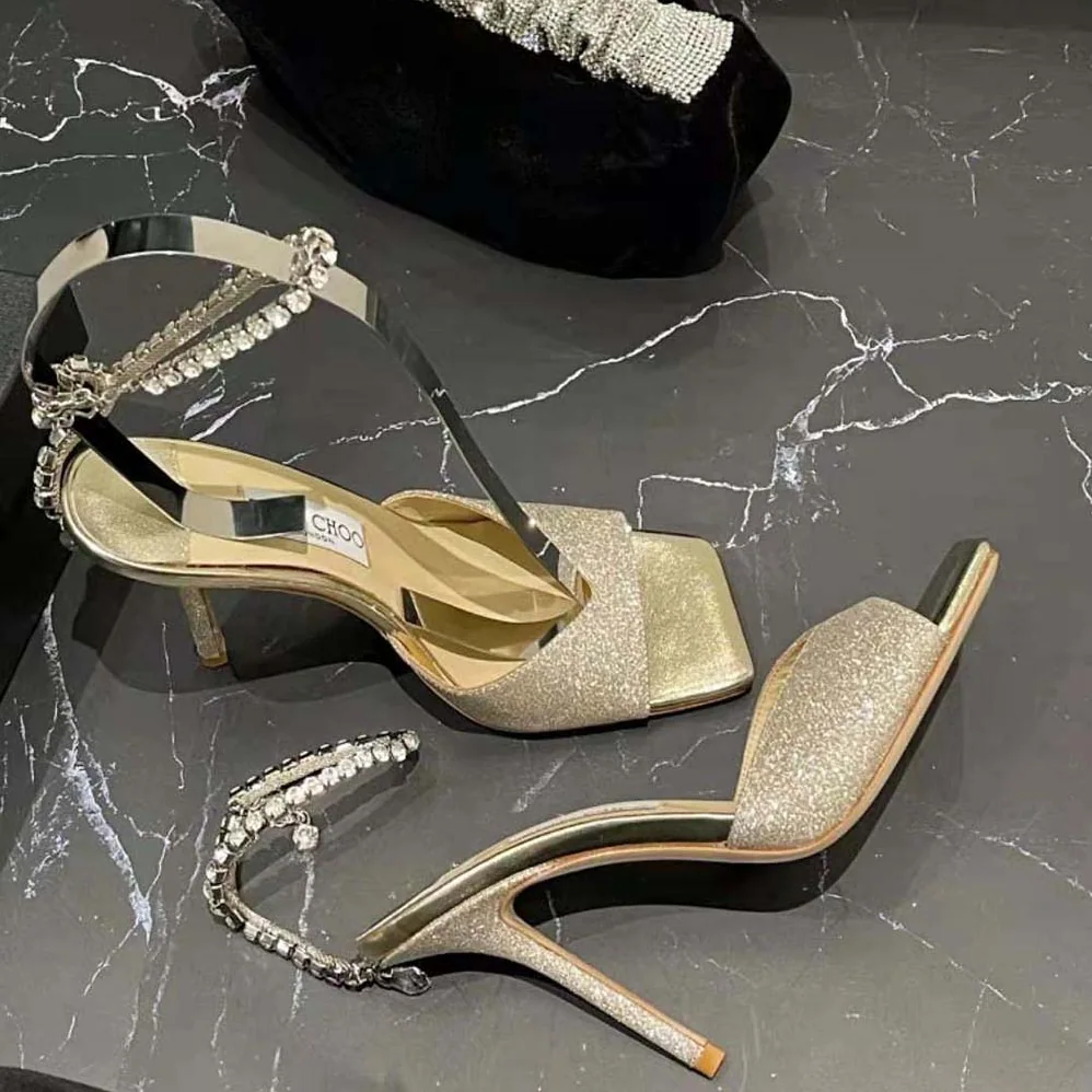 Jimmy Choo Saeda Sandal 100 Platinum Ice Dusty Glitter Sandals with Crystal Embellishment for Women Jimmy Choo Saeda Sandal 100 Platinum Ice Dusty Glitter Sandals with Crystal Embellishment for Women