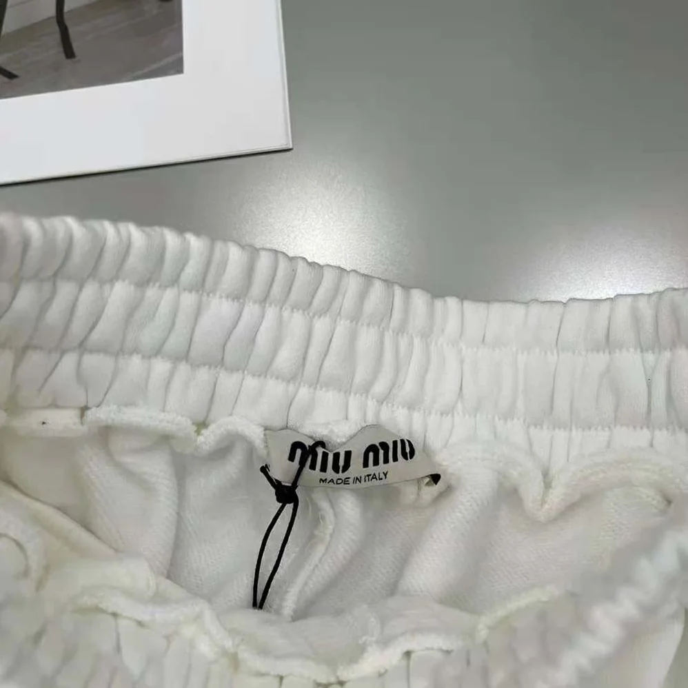 Miu Miu Embroidered Cotton Shorts with Embroidered Logo for Women in White