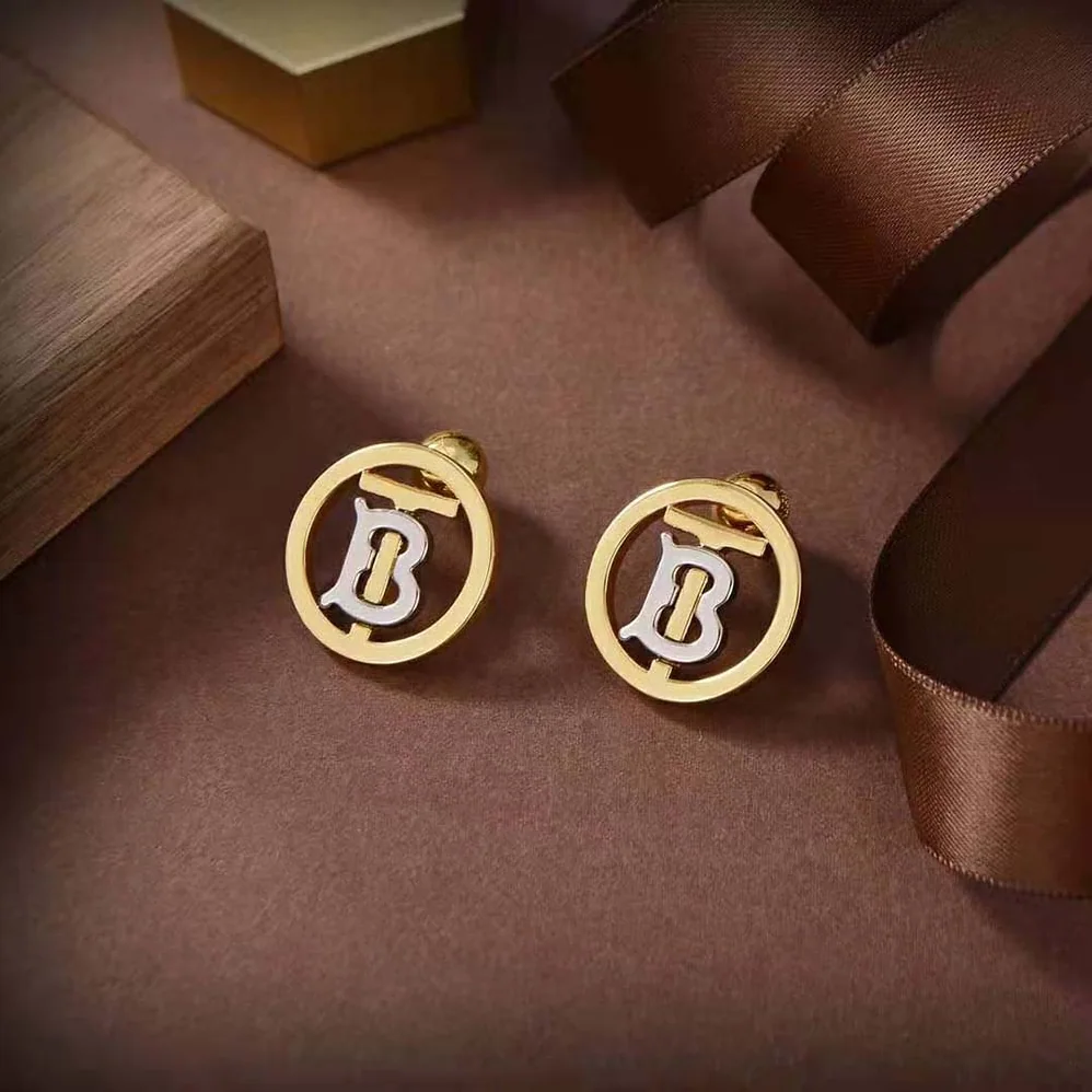 Burberry Gold and Palladium for Women in plated Monogram Motif Earrings Burberry Gold and Palladium for Women in plated Monogram Motif Earrings