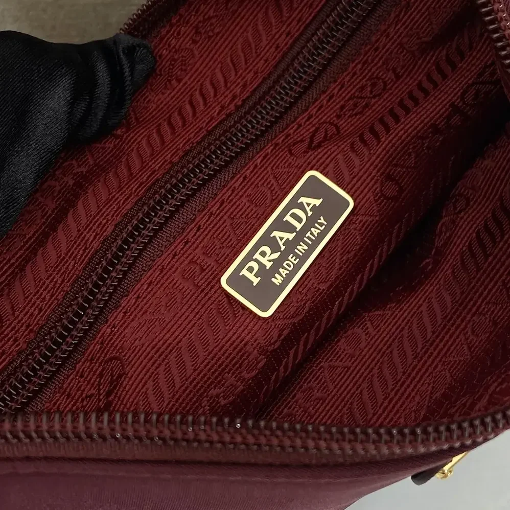 Prada Re-Nylon Pouch Enameled Metal Triangle Logo for Women Prada Re-Nylon Pouch Enameled Metal Triangle Logo for Women
