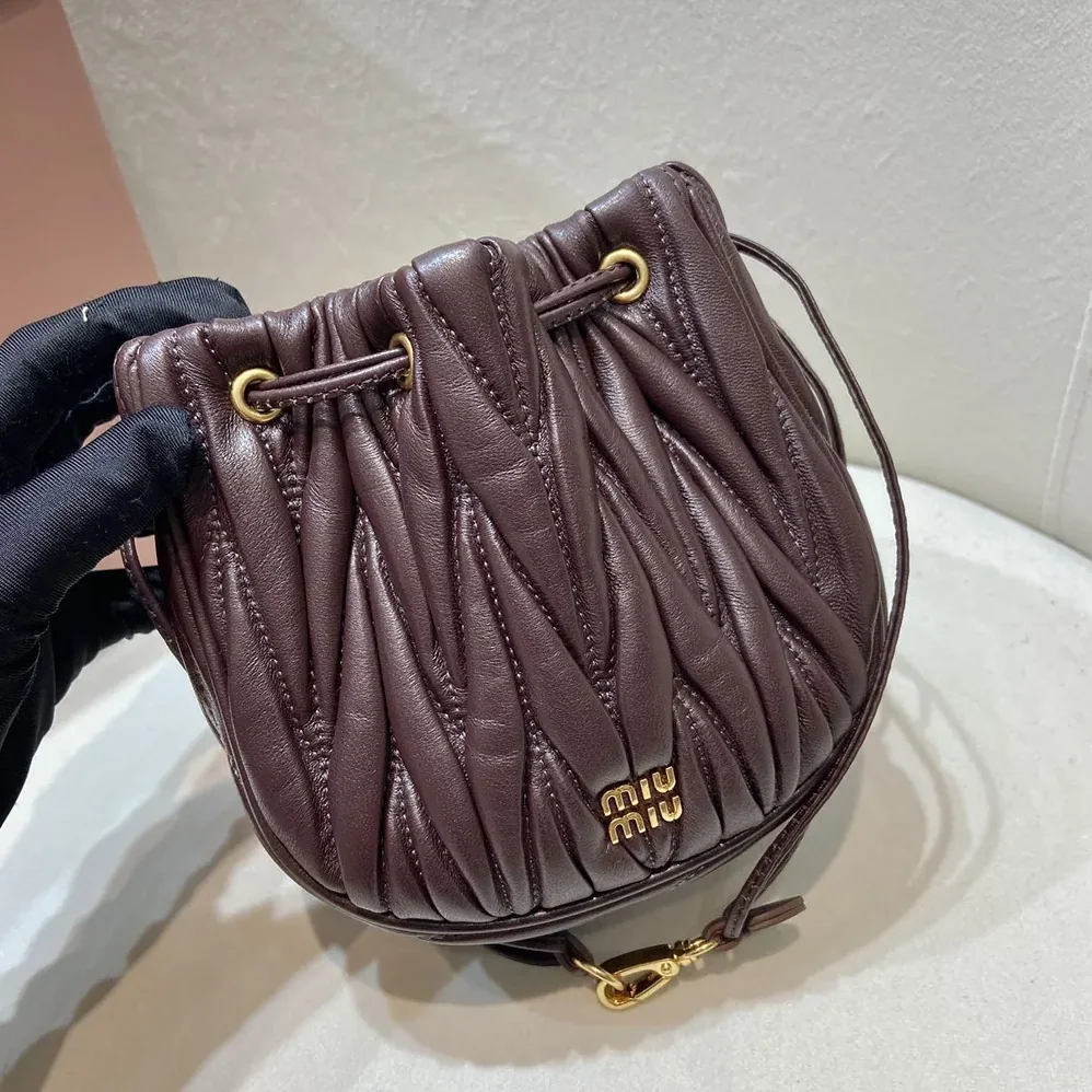 Miu Miu Matelassé Nappa Leather Pouch for Women in Burgundy Miu Miu Matelassé Nappa Leather Pouch for Women in Burgundy
