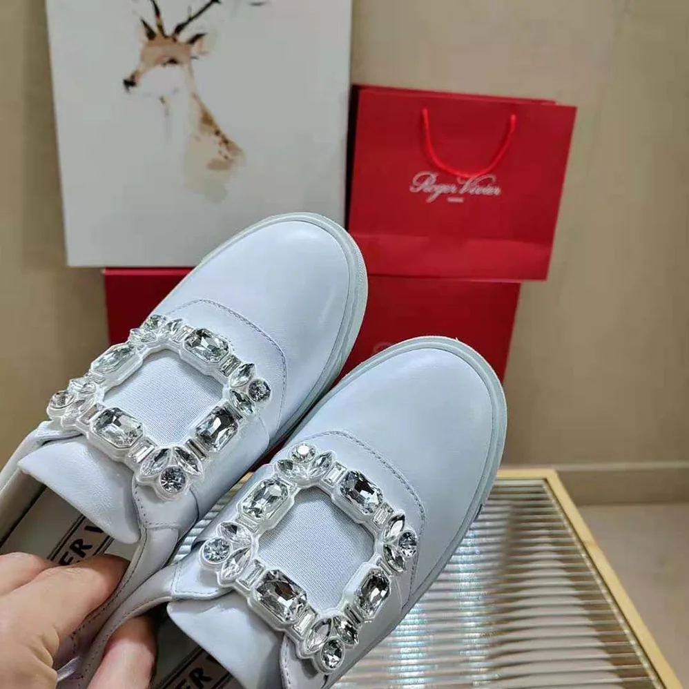 Roger Vivier Very Vivier Strass Buckle Sneakers in Leather for Women in White Roger Vivier Very Vivier Strass Buckle Sneakers in Leather for Women in White