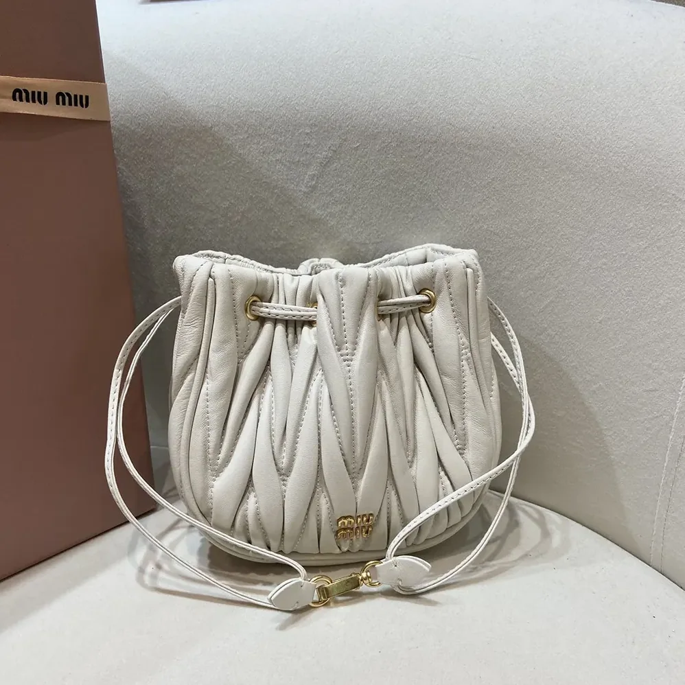 Miu Miu Matelassé Nappa Leather Pouch for Women in White Miu Miu Matelassé Nappa Leather Pouch for Women in White