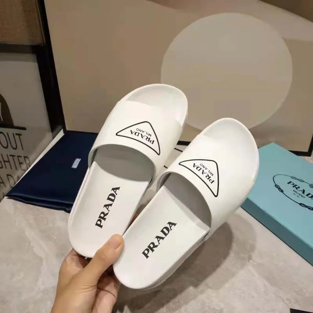 Prada Leather Slides in 20mm Heel for Women in White Prada Leather Slides in 20mm Heel for Women in White