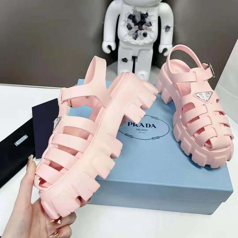 Prada Foam Rubber Sandals with Enameled Metal Triangle Logo for Women in Pink