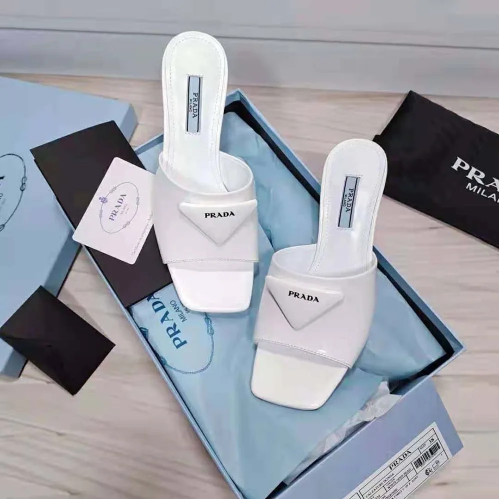 Prada Brushed Leather Mid-heeled Slides in 65mm Heel for Women in White Prada Brushed Leather Mid-heeled Slides in 65mm Heel for Women in White