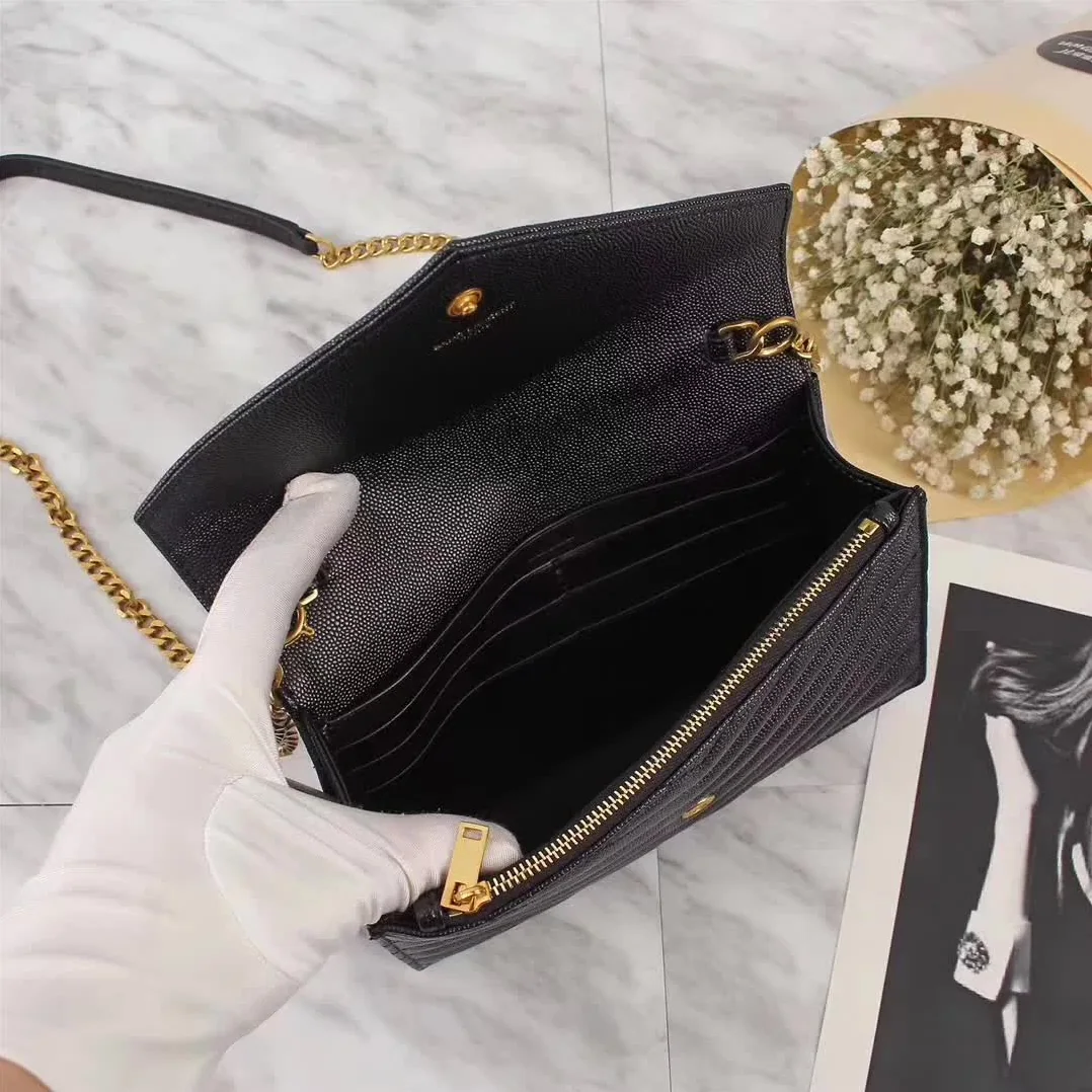 Saint Laurent YSL Medium Monogram Envelope Chain Wallet Gold Hardware in Black Saint Laurent YSL Medium Monogram Envelope Chain Wallet Gold Hardware in Black
