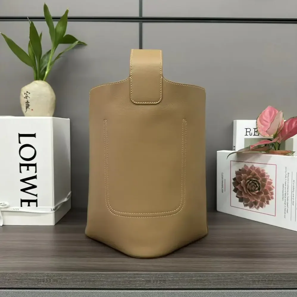 Loewe Mini Pebble Bucket Bag in Soft Grained Calfskin for Unisex in Sandy Loewe Mini Pebble Bucket Bag in Soft Grained Calfskin for Unisex in Sandy