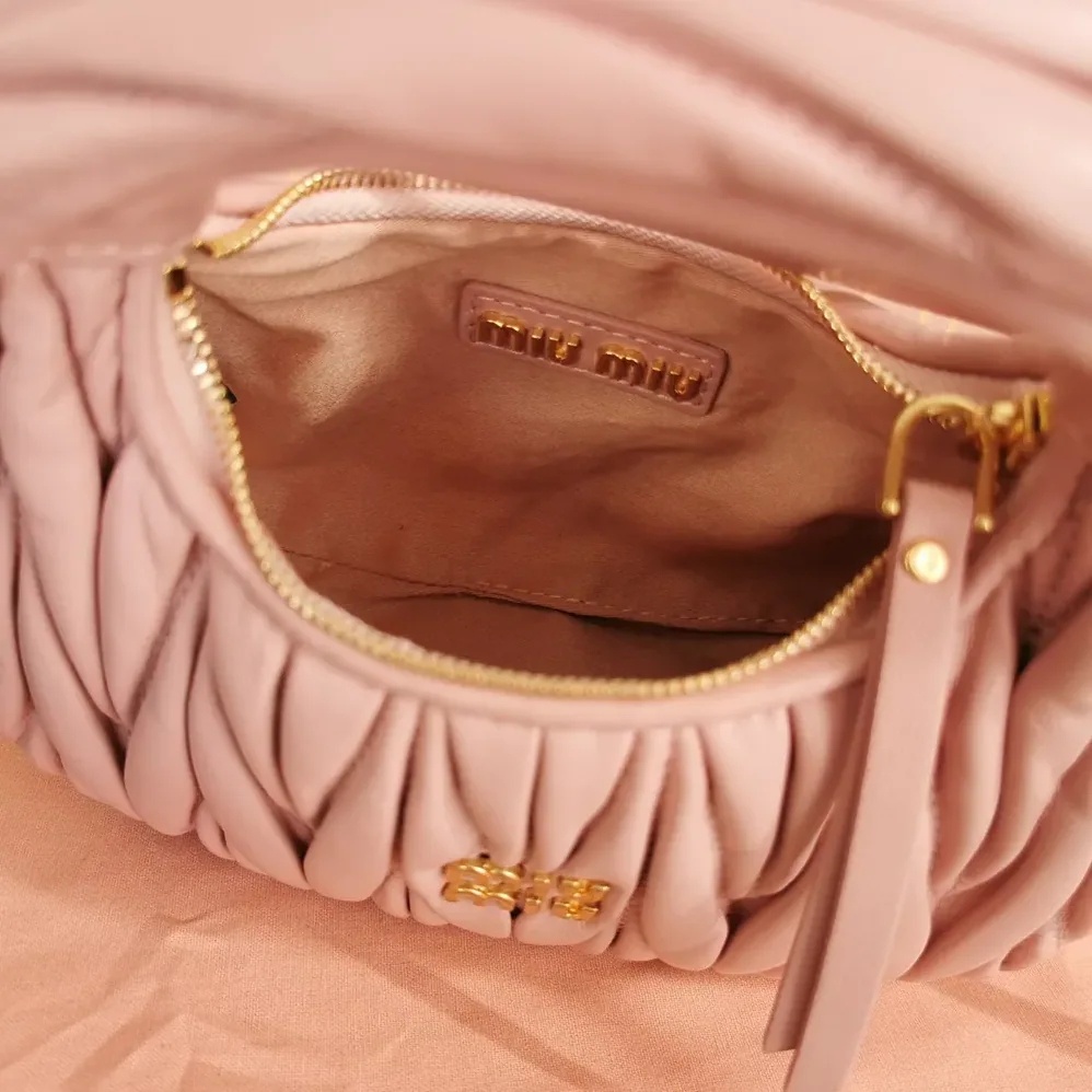 Miu Miu Wander Matelassé Nappa Leather Hobo Mini-Bag for Women in Powder Pink