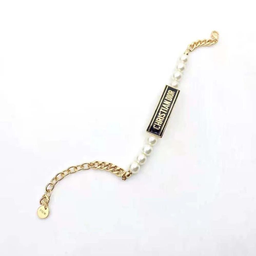 Dior Dior-id Bracelet Gold-Finish Metal with White Resin Pearls and Black Lacquer for Women Dior Dior-id Bracelet Gold-Finish Metal with White Resin Pearls and Black Lacquer for Women