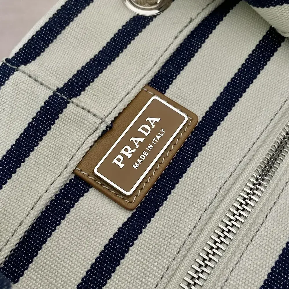 Prada Striped Canvas Drawstring Duffel Bag for Unisex in White