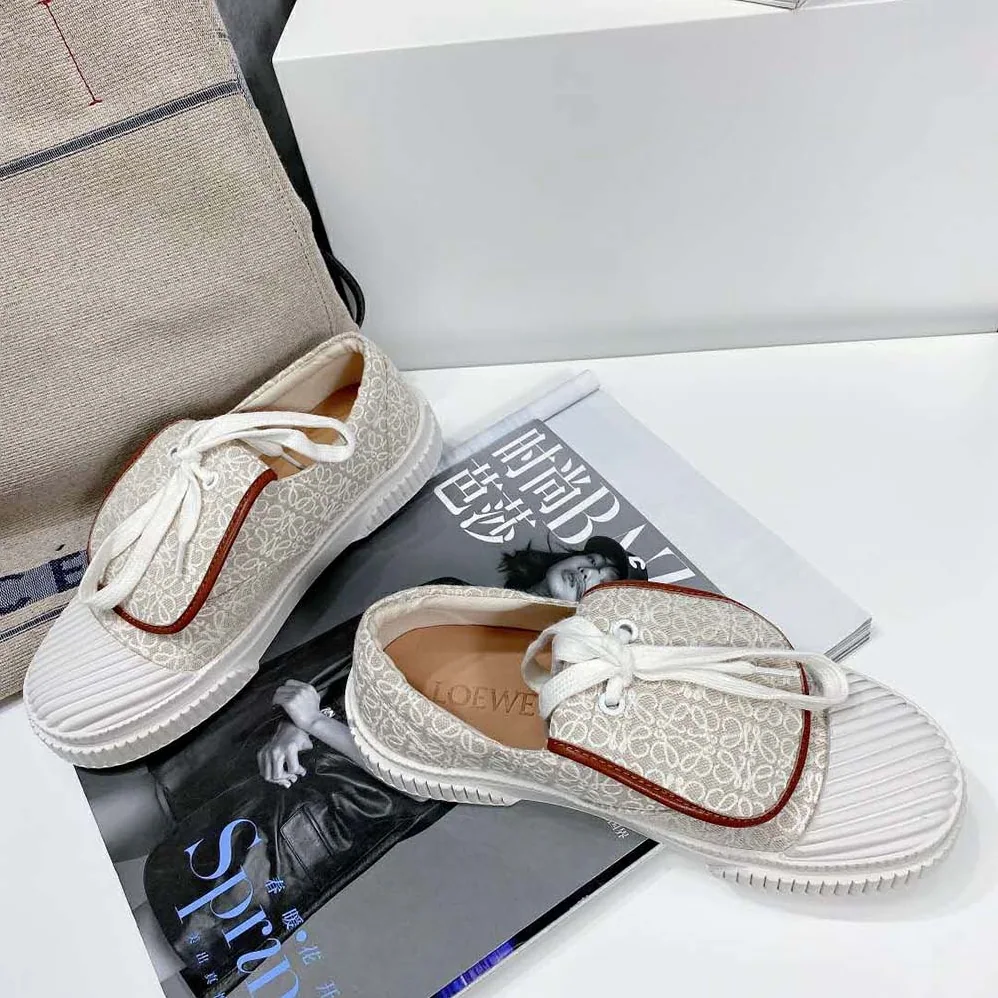 Loewe Anagram Flap Sneaker in Canvas for Women in White Loewe Anagram Flap Sneaker in Canvas for Women in White