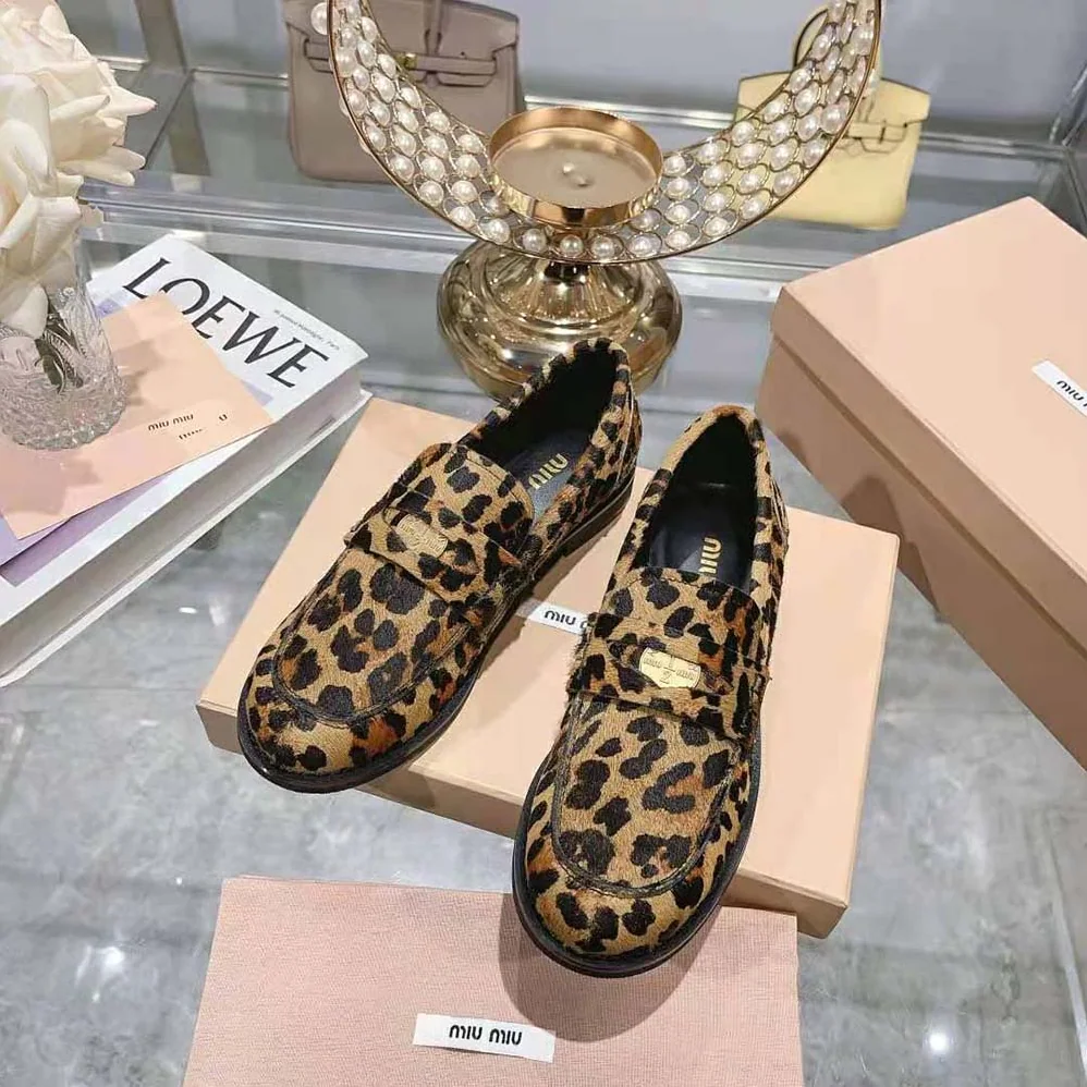 Miu Miu Leopard-print Calf Hair for Women in effect Loafers