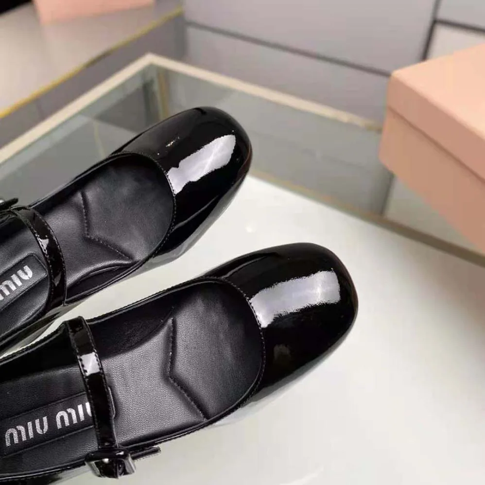 Miu Miu Patent Leather Pumps with Metal Lettering Logo for Women in Black Miu Miu Patent Leather Pumps with Metal Lettering Logo for Women in Black