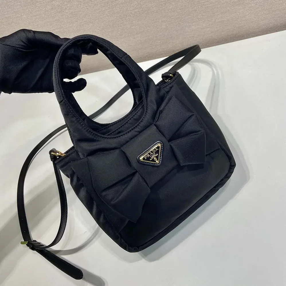 Prada Padded Re-Nylon Mini for Women in bag with Bow