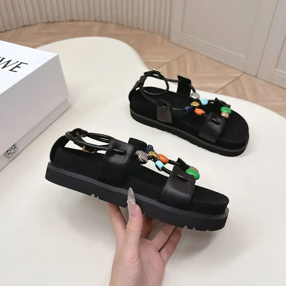 Loewe Pebble Beads Fussbett Sandal in Nappa Lambskin for Women in Black Loewe Pebble Beads Fussbett Sandal in Nappa Lambskin for Women in Black