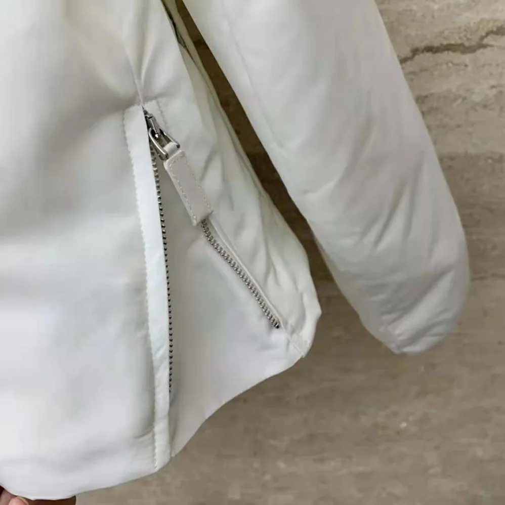 Prada Padded Duchesse Jacket with Enameled Metal Triangle Logo for Women in White