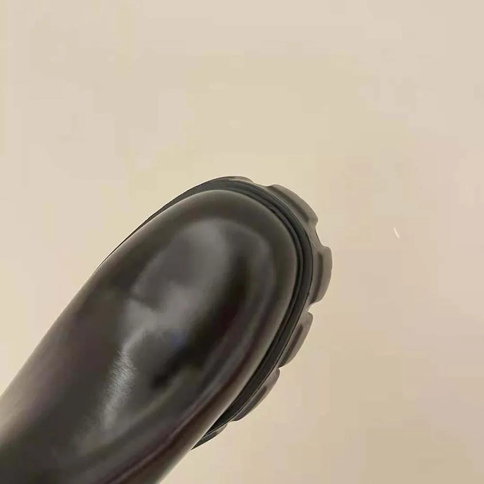 Prada Monolith Brushed Leather Booties for Women in Black