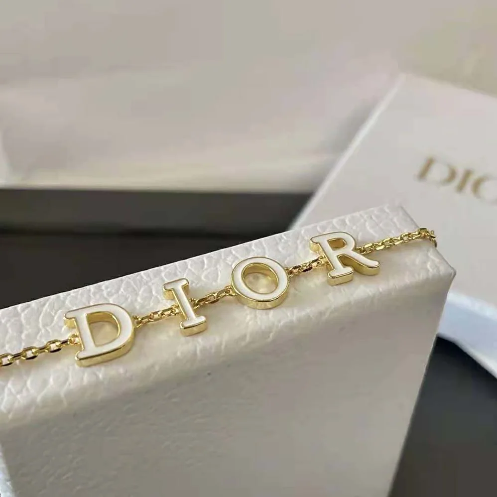 Dior Dio(r)evolution Bracelet Gold-Finish Metal and White Lacquer for Women Dior Dio(r)evolution Bracelet Gold-Finish Metal and White Lacquer for Women