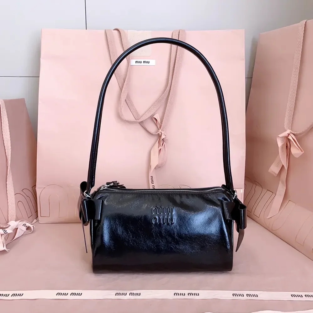Miu Miu Shiny Leather Pouch for Women in Black Miu Miu Shiny Leather Pouch for Women in Black
