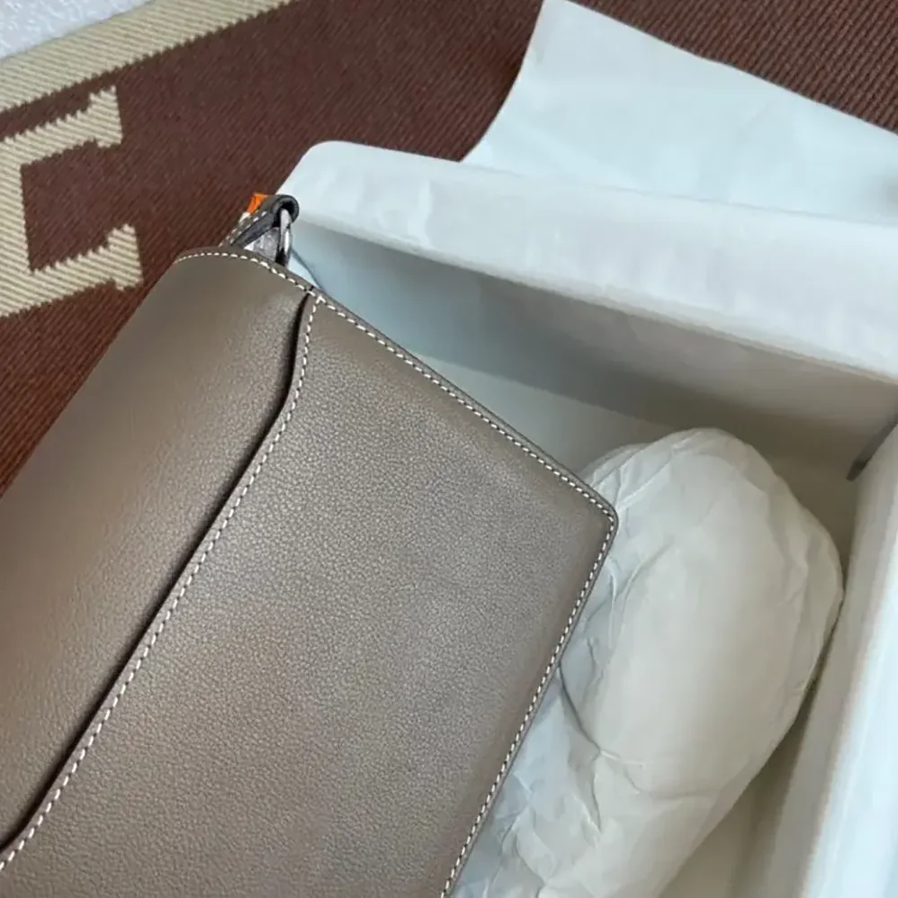 Hermes Roulis Mini Bag in Evercolor Calfskin for Women in Gray/Silver Hermes Roulis Mini Bag in Evercolor Calfskin for Women in Gray/Silver