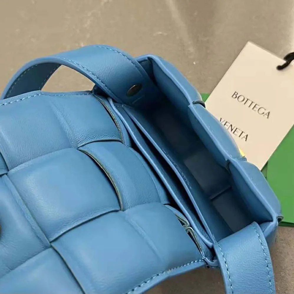Bottega Veneta Candy Padded Cassette Mini Padded Intreccio Leather Cross-Body Bag for Women in Blue Bottega Veneta Candy Padded Cassette Mini Padded Intreccio Leather Cross-Body Bag for Women in Blue