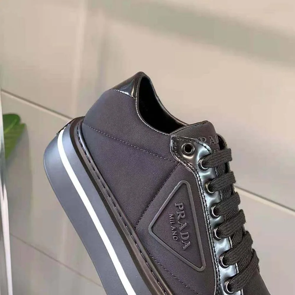 Prada Macro Re-Nylon and Brushed Leather Sneakers for Women in Black