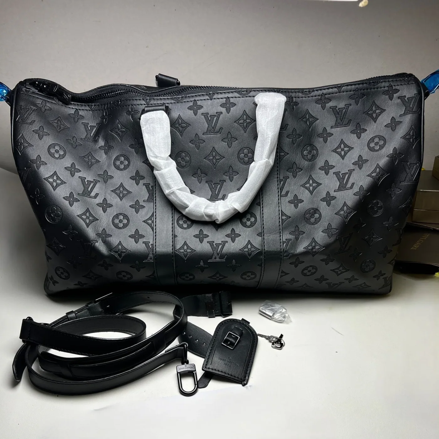 Louis Vuitton Keepall Bandouliere 50 Travel Bag in Black Matte Black Hardware Louis Vuitton Keepall Bandouliere 50 Travel Bag in Black Matte Black Hardware