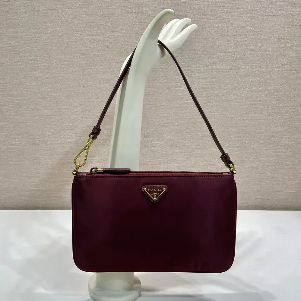 Prada Re-Nylon Pouch Enameled Metal Triangle Logo for Women Prada Re-Nylon Pouch Enameled Metal Triangle Logo for Women