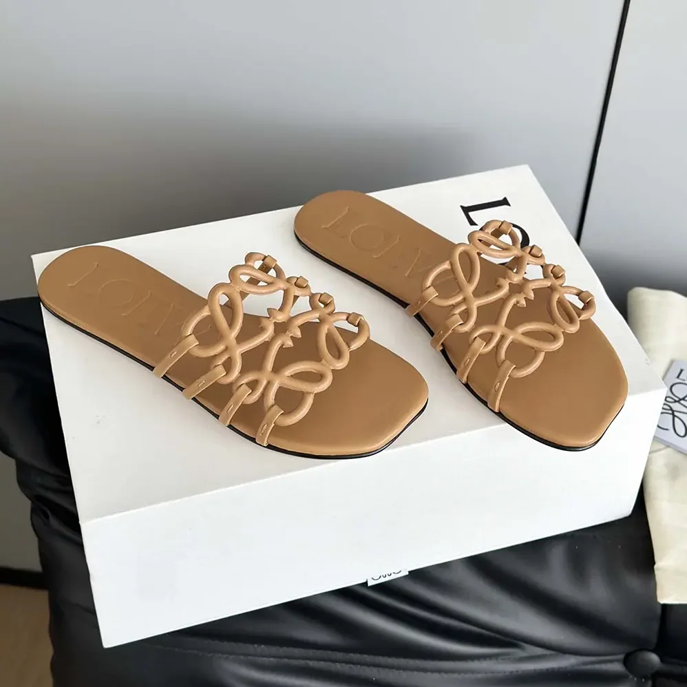 Loewe Petal Anagram Slide in Soft Calfskin for Women in Brown Loewe Petal Anagram Slide in Soft Calfskin for Women in Brown
