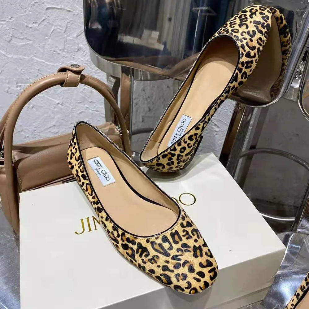 Jimmy Choo Mirele Flat Natural Mix Leopard Print Pony Flats with JC Emblem for Women Jimmy Choo Mirele Flat Natural Mix Leopard Print Pony Flats with JC Emblem for Women