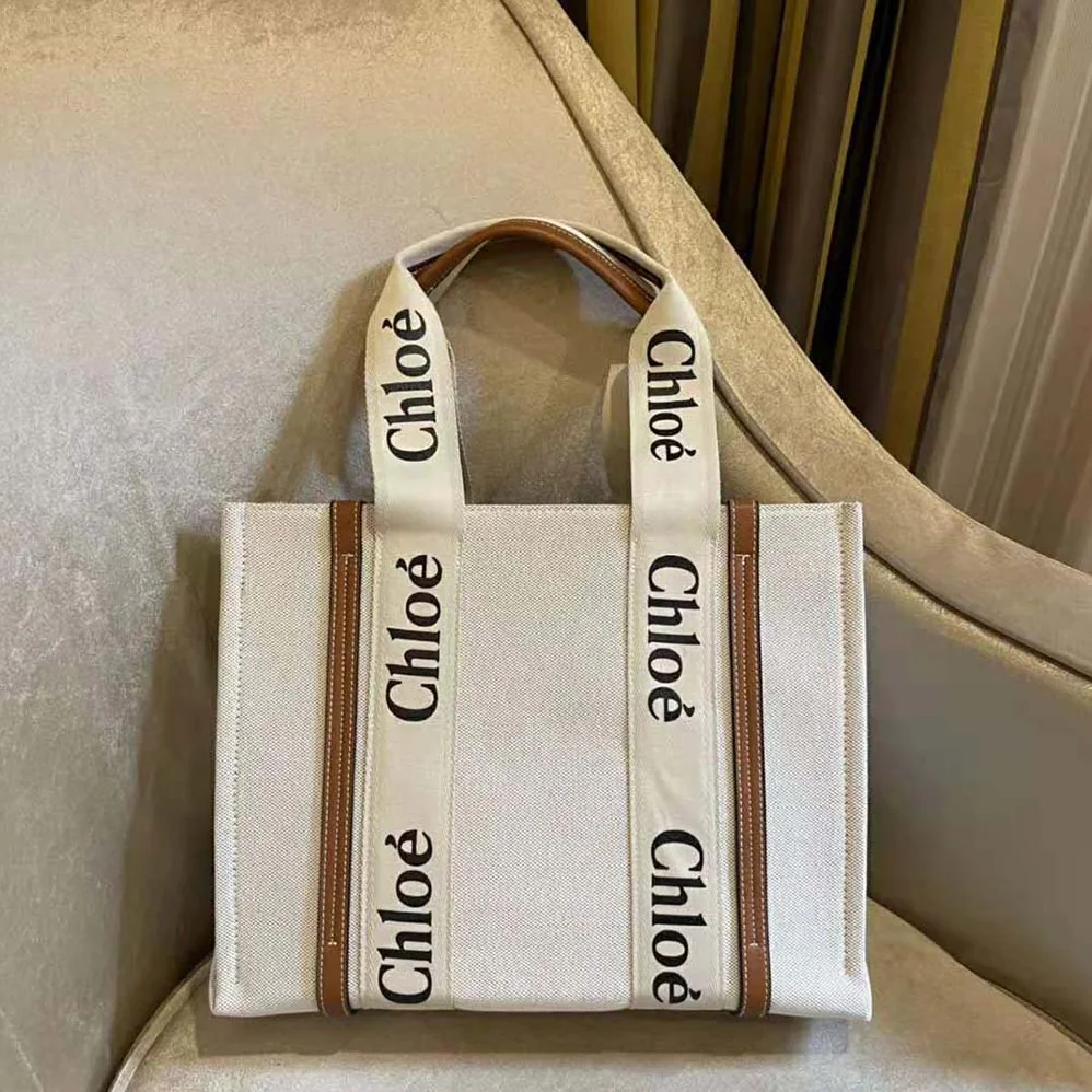 Chloe Medium Woody Tote Bag in Cotton Canvas and Shiny Calfskin with Woody Ribbo for Women in Brown Chloe Medium Woody Tote Bag in Cotton Canvas and Shiny Calfskin with Woody Ribbo for Women in Brown