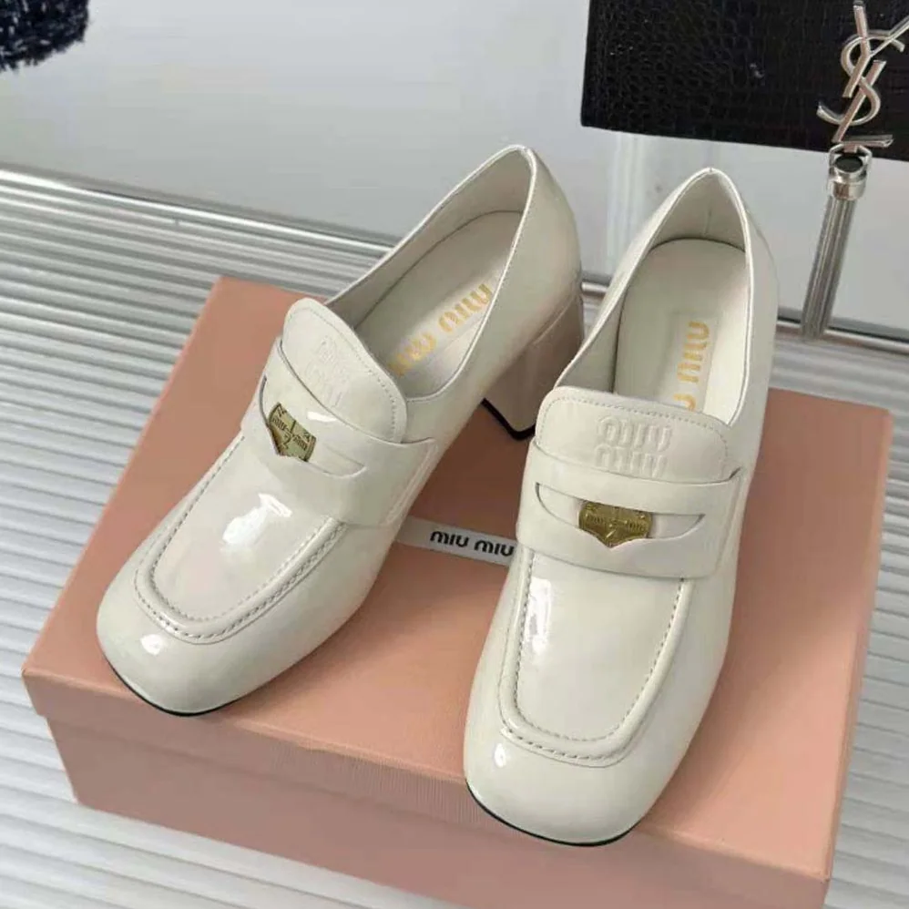 Miu Miu Patent Leather Loafers with Embossed Logo on the Tongue for Women in White Miu Miu Patent Leather Loafers with Embossed Logo on the Tongue for Women in White