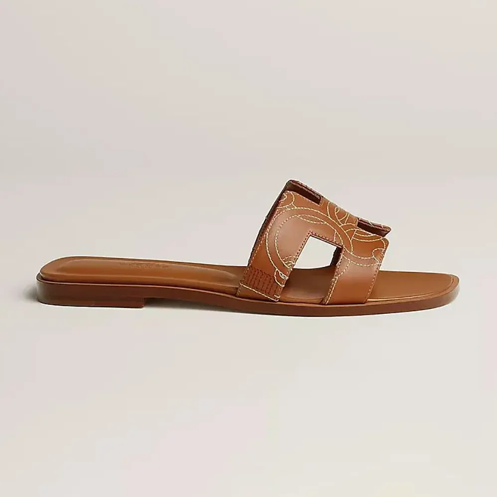 Hermes Oran sandal in “Panoplie Equestre” Embroidered Calfskin for Women in Brown Hermes Oran sandal in “Panoplie Equestre” Embroidered Calfskin for Women in Brown