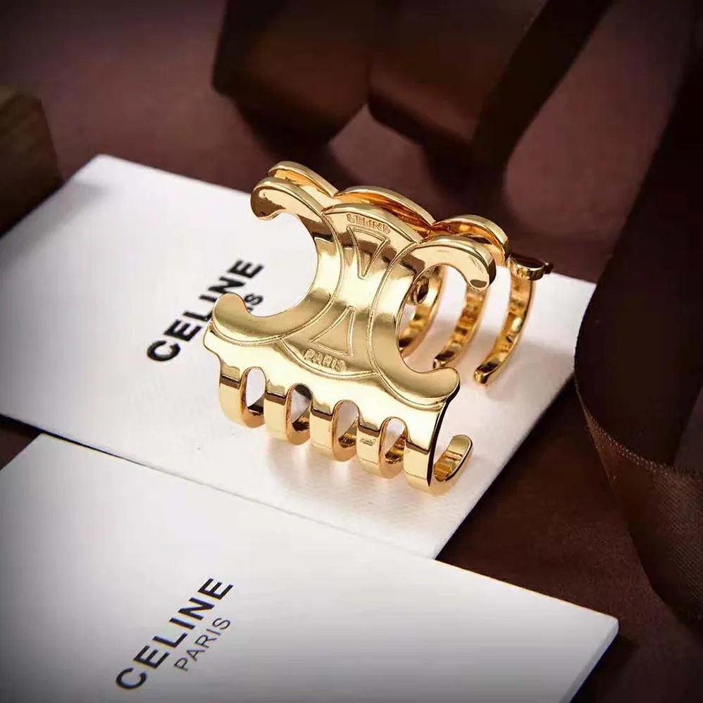 Celine Triomphe Medium Hair Claw in Zamak and Steel with Gold Finish for Women Celine Triomphe Medium Hair Claw in Zamak and Steel with Gold Finish for Women