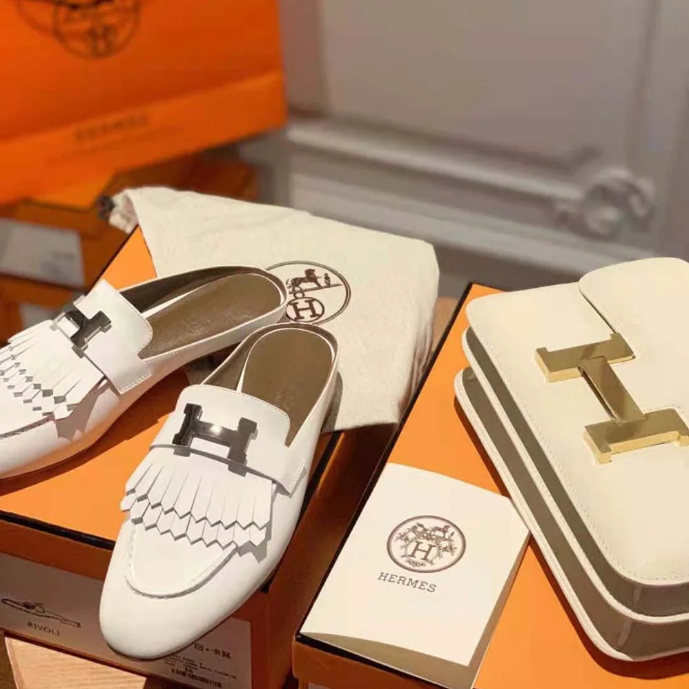Hermes Rivoli Mule Mule in Calfskin with Fringe Detail for Women in White Hermes Rivoli Mule Mule in Calfskin with Fringe Detail for Women in White